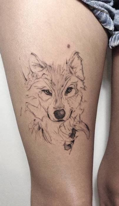 Ideias incríveis de tatuagem de lobo feminino para a coxa